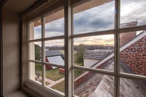 Service wing and yard from attic stair window