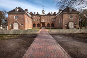 West front, 1695-97, with south chapel wing (right) constructed 