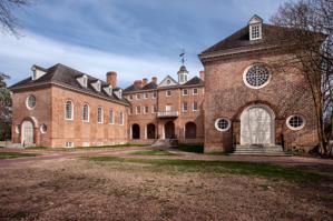 West front, 1695-97, with south chapel wing (right) constructed 