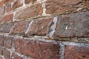 Cut-brick water table, north gable, 1695-97
