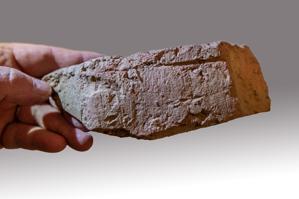 Msrks left from wet mold of this locally made mullion brick for 