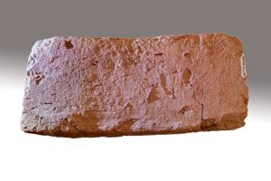 Swirl marks on bottom of brick from moving off of molding table;