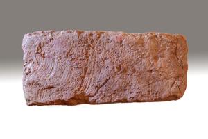 Swirl marks on bottom of brick from moving off of molding table;