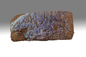 Locally made brick, 1667. Struck face defaced by raim before fir
