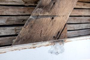 Reused 1684 stud, with carpenter mark X from original use  (17