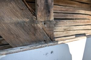 Reused 1684 stud, with carpenter mark partially severed (1797 re