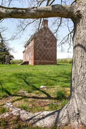 Diaper patterned brickwork on gable, dated 1722