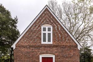 Raking glazed headers in upper west gable; ca. 1725
