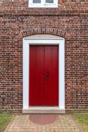 West door with rebuilt arch; ca. 1725