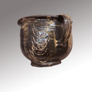 Locally made, trailed slipware chamber pot; possibly late 17th o