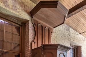 Original sounding board with later remodeling of the pulpit; 173