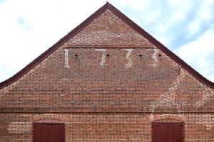 East end with date 1733 picked out in glazed headers