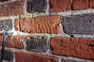 Child's hand print made in brick during manufacture; 1733