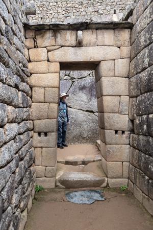Dr. Peter Abramenko in Inca ddoorway, 15th century