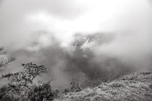Fog descending across Inca ruins