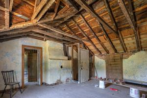 Original second floor quarter above kitchen; 1760s. Walls raised