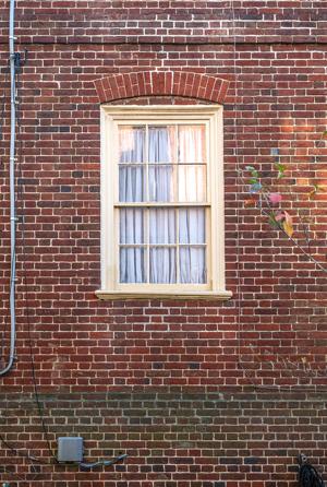 Segmental arch over window on gable