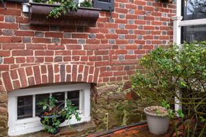 Cellar window on Queen Street front; ca, 1730