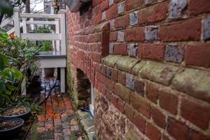 Water table rises over cellar window on Queen St. facade, ca. 17