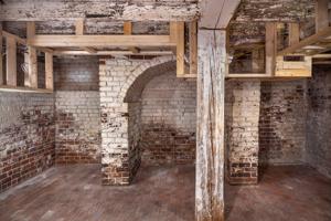 Replaced post to support 1st-floor girt in cellar;chimney vault 