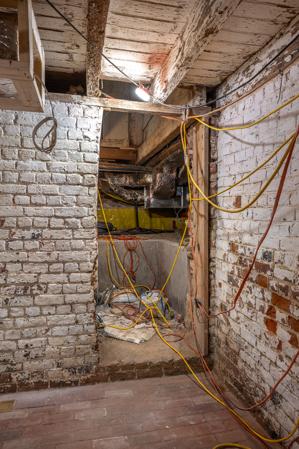 Opening cut through cellar wall in 1835 when ladder stair built 