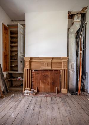 Reconstructed mantel in library representing modified appearance