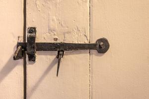 Thumb latch replacing lock on second-story closet door
