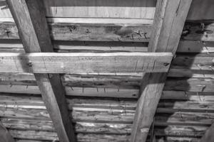 End of a layout board scribed for rafters and retained as a wind