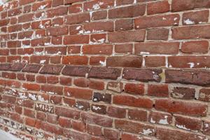 Water table, front wall, bricks cast to shape. 1765
