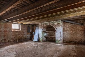 Base of parlor chimney in cellar; 1765