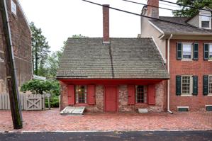 Street front; ca. 1700 and bricked in 1795