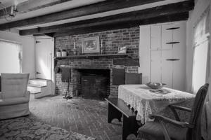 Kitchen fireplace with wooden lintel later infilled smaller; 3rd