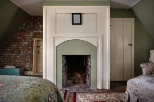 Chamber over the parlor with original firebox; ca. 1745