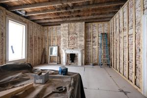 Roof literally raised to create taller 2nd story in 1880s