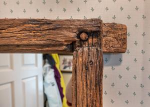 Leaded casement window frame removed from gable of brick wing, c