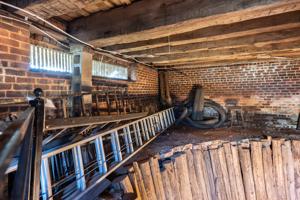 Wood-lined ice house in cellar of outbuilding; 2nd quarter 19th 