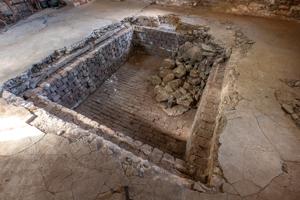 Root cellar in foreground of kitchen hearth; 1834-36