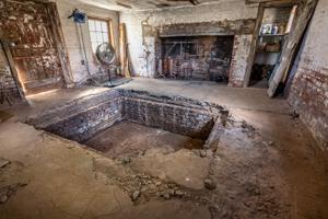 Root cellar in foreground of kitchen hearth; 1834-36