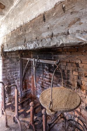 Burn marks on lintel and crane in kitchen fireplacce; 1834-36