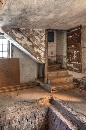 Stairs in kitchen leading to8 hospital in upper half story; 1834