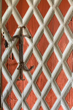 Decoratively painted board-and-batten door