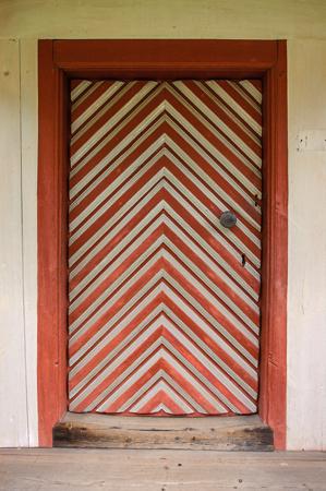 Decoratively painted board-and-batten door