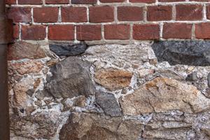 Galleting set in original mortar on rear of gable end; 1765