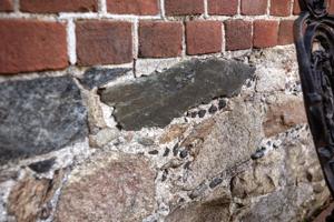 Galleting set in original mortar on rear of gable end; 1765