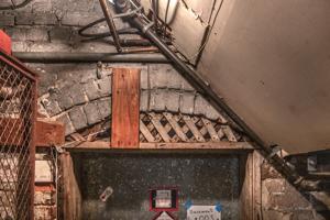Centering for arch in cellar door remains intact; lattic is mode