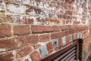 Cast, beveled water table brick; 1750