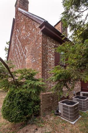 Gable decorated with glazed headers in a diaper pattern; 1750