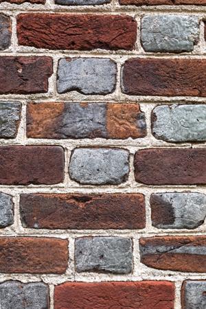 Glazed-header Flemish bond brickwork set in shell-lime mortar; c