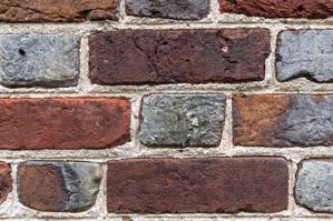 Glazed-header Flemish bond brickwork set in shell-lime mortar; c