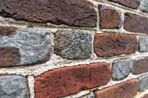 Glazed-header Flemish bond brickwork set in shell-lime mortar; c